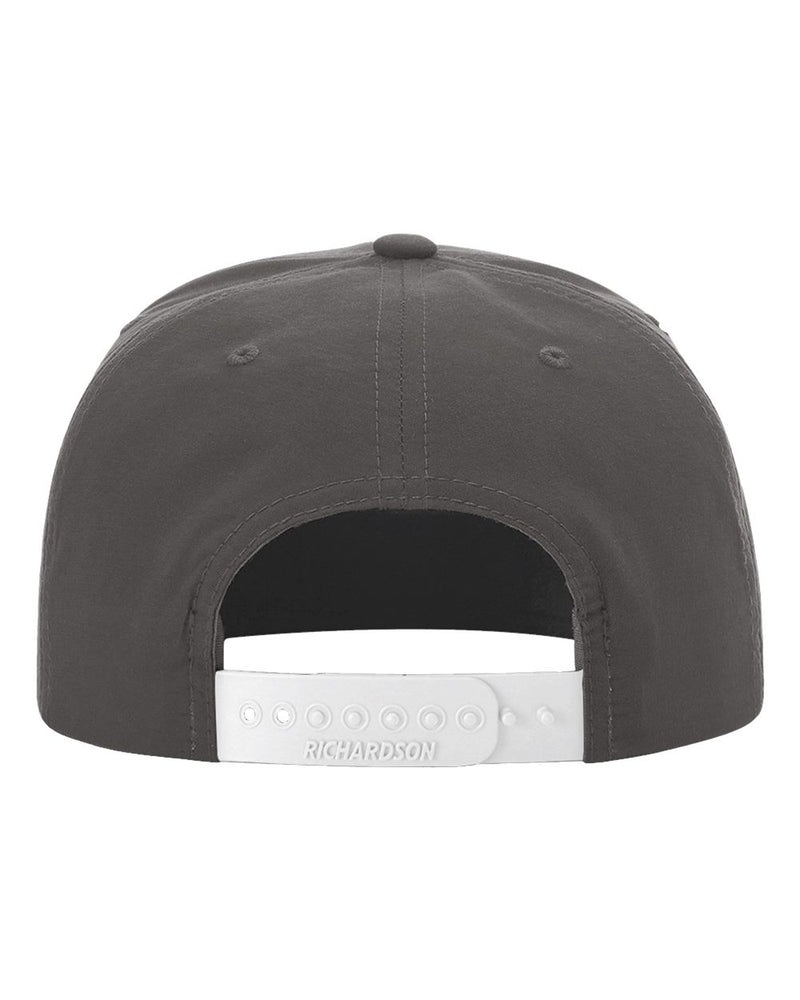 A vintage snapback hat is depicted in the image. The hat is made of high-quality, weathered denim. It features a flat brim and an adjustable strap at the back with snap fasteners.