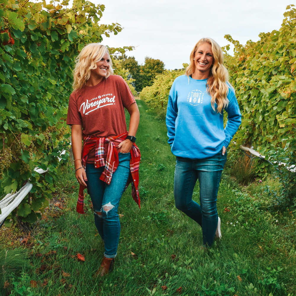 Wine Tasting in Northern Michigan in the Fall and wearing the Lakes and Grapes Vineyard Tee- Clay