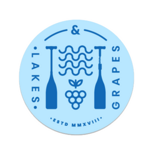 Durable and waterproof round light blue sticker with dark blue Lakes and Grapes paddle logo is durable and ready to be stuck on water bottles, laptops, and paddle boards. 