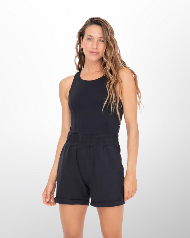 This image presents the Lakes and Grapes Black Active Running Shortsie, a versatile and comfortable activewear piece designed for women. Features a jersey tank with contouring princess seams thicker straps for support, and stretch woven shorts with slash pockets