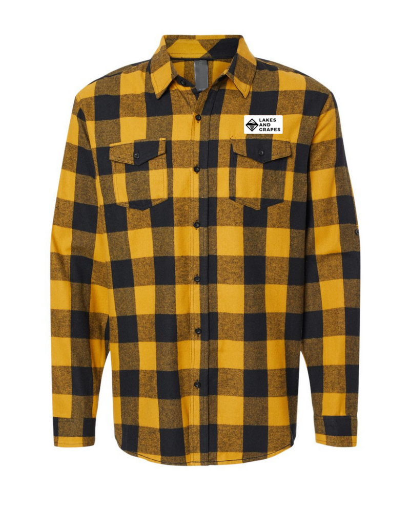The image features a Summit Flannel, a warm and cozy garment designed for comfort and style. The flannel shirt is made from soft, brushed fabric that provides a gentle texture against the skin.