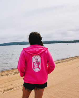 This image features the Lakes and Grapes Adventure Zip Hoodie. It provides warmth and super soft comfort, making it ideal for various outdoor activities.