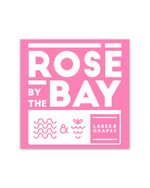The image features the "Rosé by the Bay" Pink Sticker, a delightful and charming design. A perfect addition to various items, adding a touch of elegance and sophistication to your belongings.