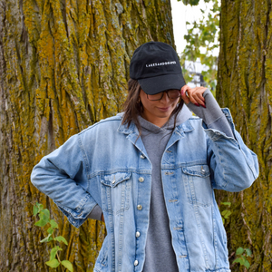 Wear this Lakes and Grapes classic black cap on any adventure, from the lakeshore to the woods of Northern Michigan.