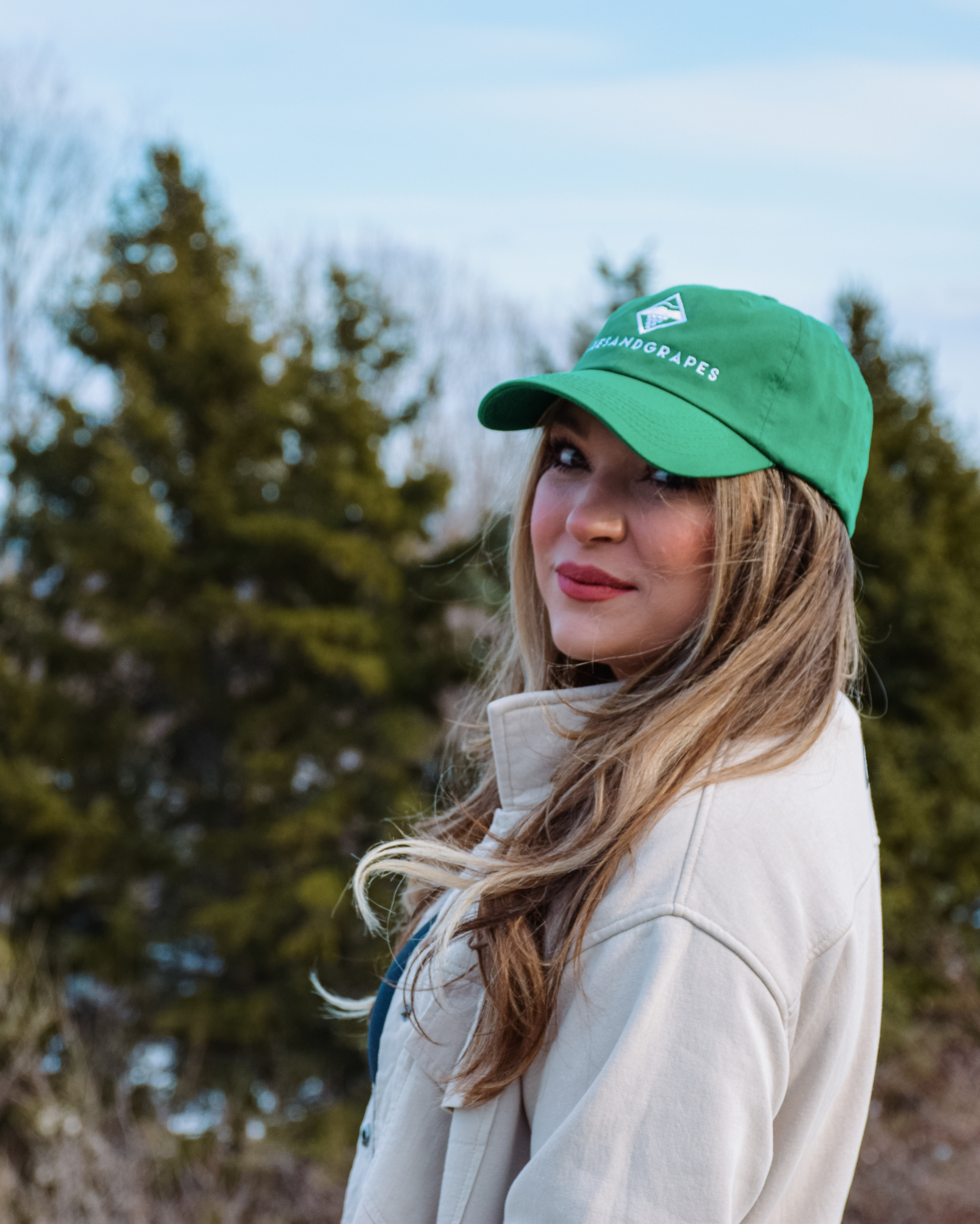 This image features the Lakes and Grapes Classic Baseball Hat. A comfortable and cool baseball cap made with a lightweight, breathable material.