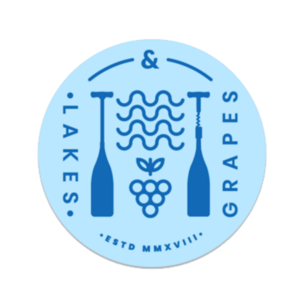 
            
                Load image into Gallery viewer, Durable and waterproof round light blue sticker with dark blue Lakes and Grapes paddle logo is durable and ready to be stuck on water bottles, laptops, and paddle boards. 
            
        