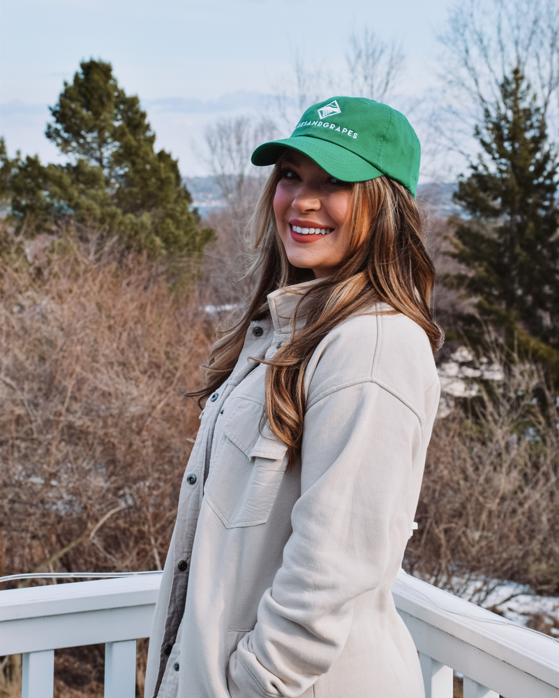 
            
                Load image into Gallery viewer, This image features the Lakes and Grapes Classic Baseball Hat. A comfortable and cool baseball cap made with a lightweight, breathable material.
            
        