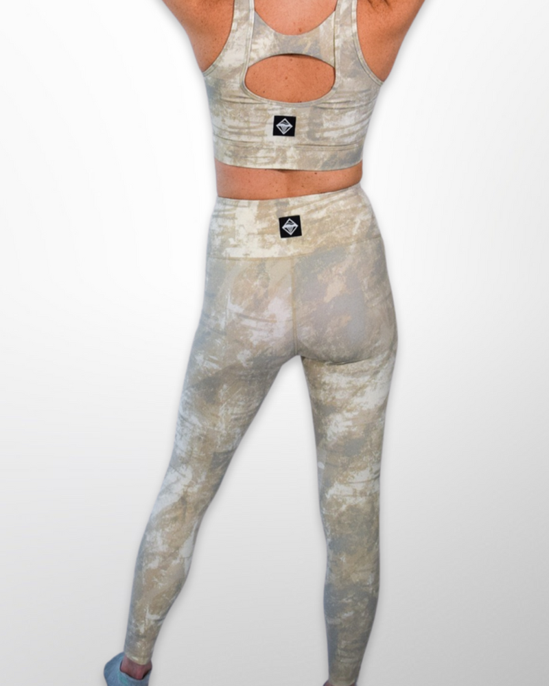 The image displays a Tie Dye Active High-Waist Legging, a trendy and comfortable activewear bottom. The fabric is stretchy and breathable, allowing for ease of movement during workouts or daily activities. 